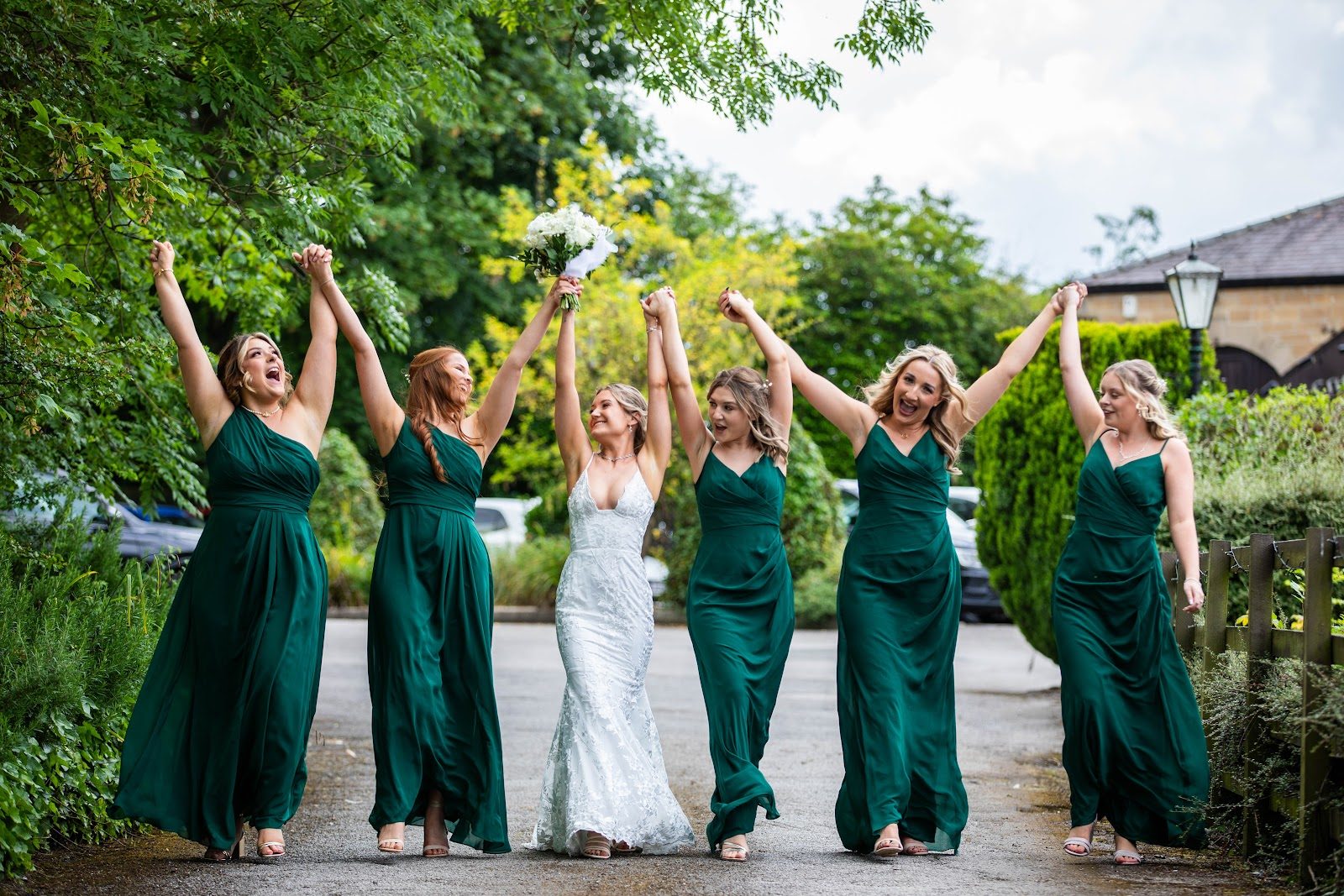 The bride and her bridesmaids outside the venue