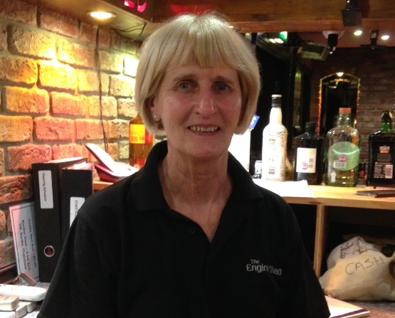 Jan, the bar supervisor, behind the bar at The Engine Shed